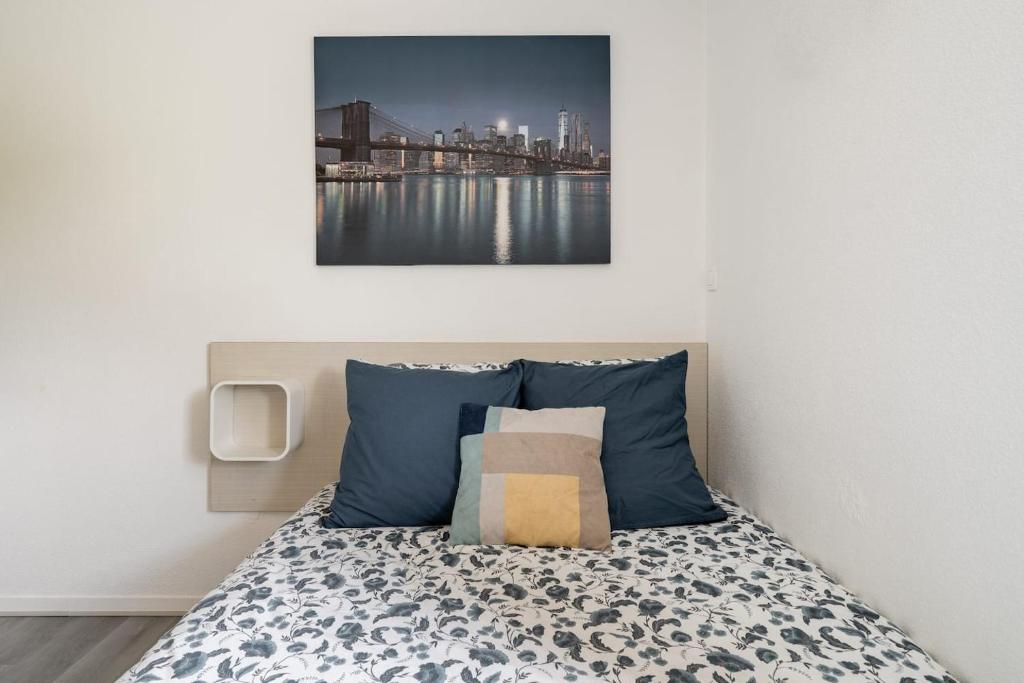 Ένα ή περισσότερα κρεβάτια σε δωμάτιο στο Studio Tranquille et COSY Fonderie