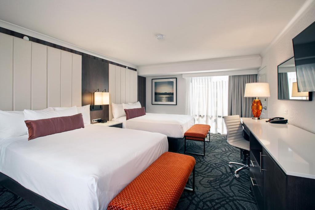 Ένα ή περισσότερα κρεβάτια σε δωμάτιο στο J Resort