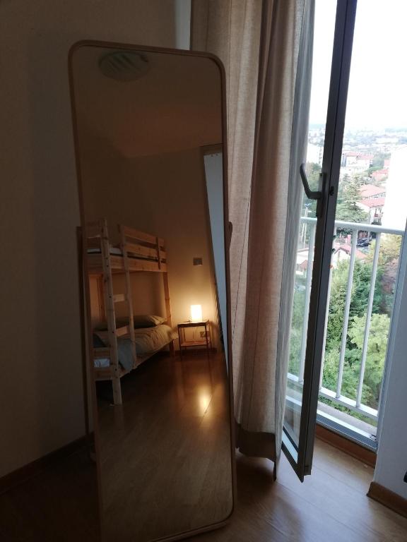 Łóżko lub łóżka w pokoju w obiekcie Nino e Issi Apartment