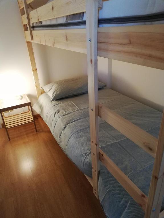 Łóżko lub łóżka w pokoju w obiekcie Nino e Issi Apartment