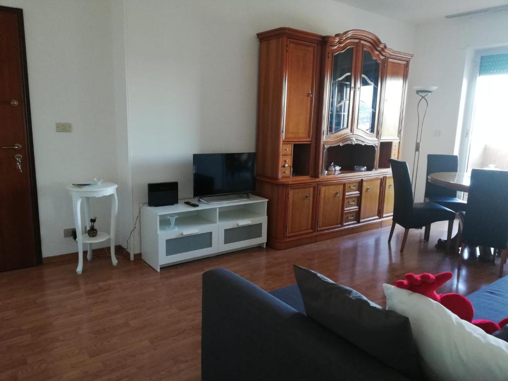 Telewizja i/lub zestaw kina domowego w obiekcie Nino e Issi Apartment