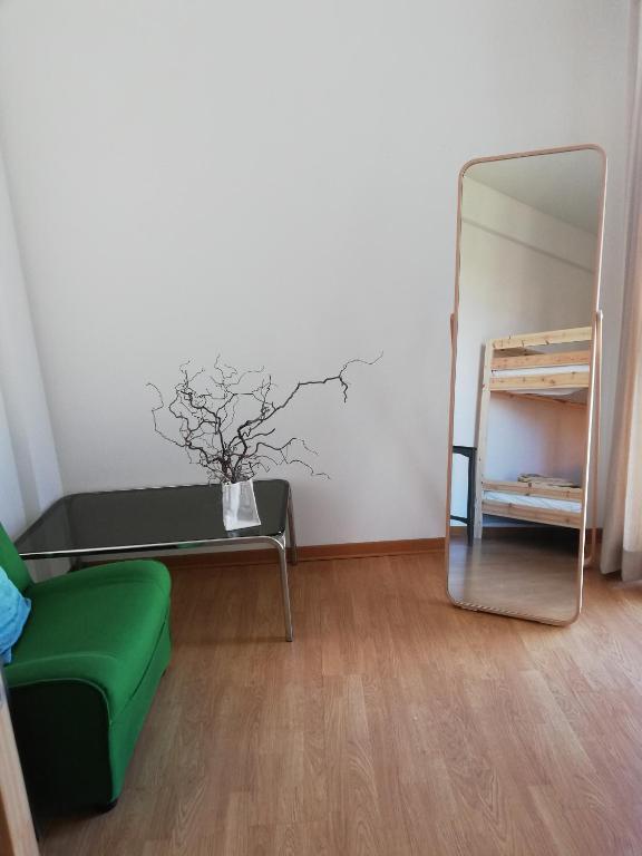 Łóżko lub łóżka w pokoju w obiekcie Nino e Issi Apartment