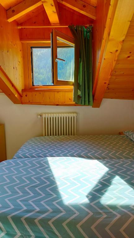 Postel nebo postele na pokoji v ubytování CASA EMMA