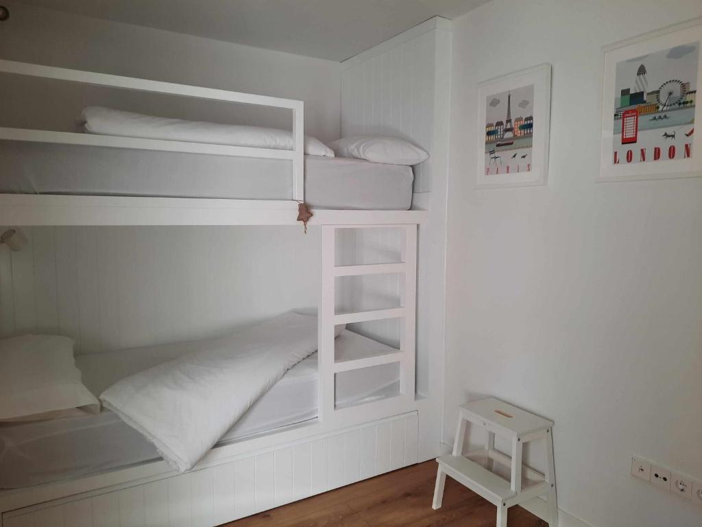 Postel nebo postele na pokoji v ubytování Casa El Cajico alojamiento vacacional en Panticosa