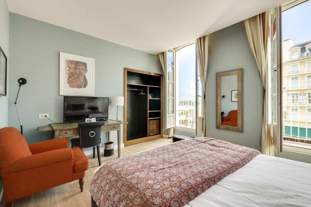 Postel nebo postele na pokoji v ubytování Hotel De L'Océan
