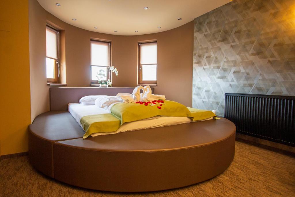 Postel nebo postele na pokoji v ubytování Veres Motel
