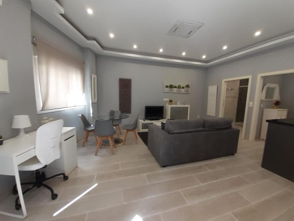 Televízia a/alebo spoločenská miestnosť v ubytovaní Apartamento Casa Lozano
