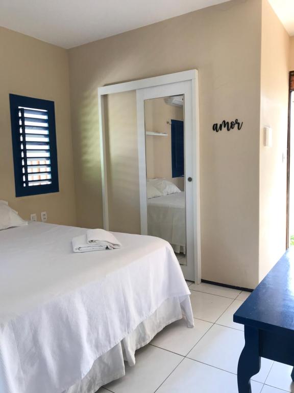Postel nebo postele na pokoji v ubytování Casa de pescador