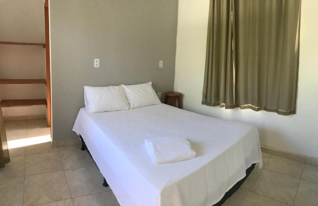 Postel nebo postele na pokoji v ubytování Casa de pescador
