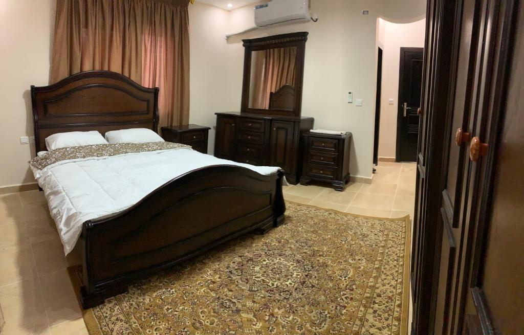 Postel nebo postele na pokoji v ubytování Amro Petra Apartment