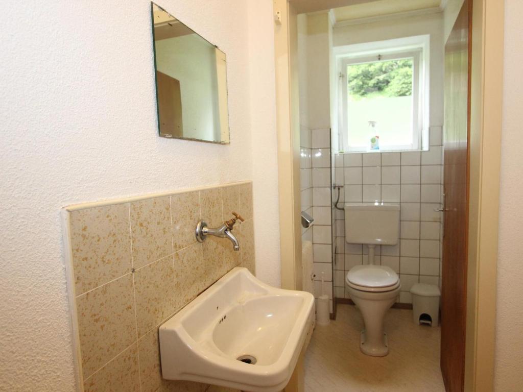 Kúpeľňa v ubytovaní Ferienhaus Marina