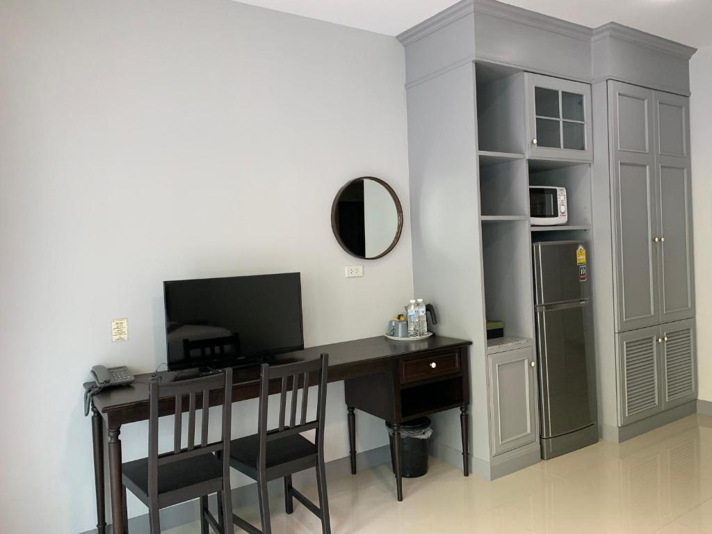 TV a/nebo společenská místnost v ubytování Double Tree Residence