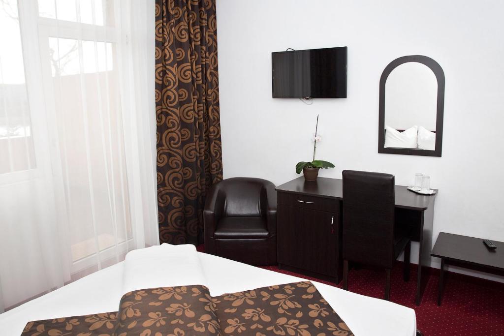 Postel nebo postele na pokoji v ubytování Hotel Terra