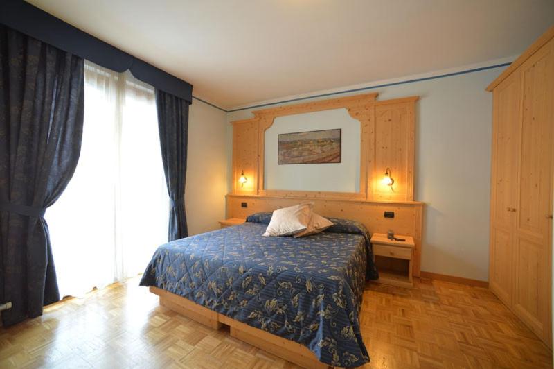 Postel nebo postele na pokoji v ubytování Hotel Canada