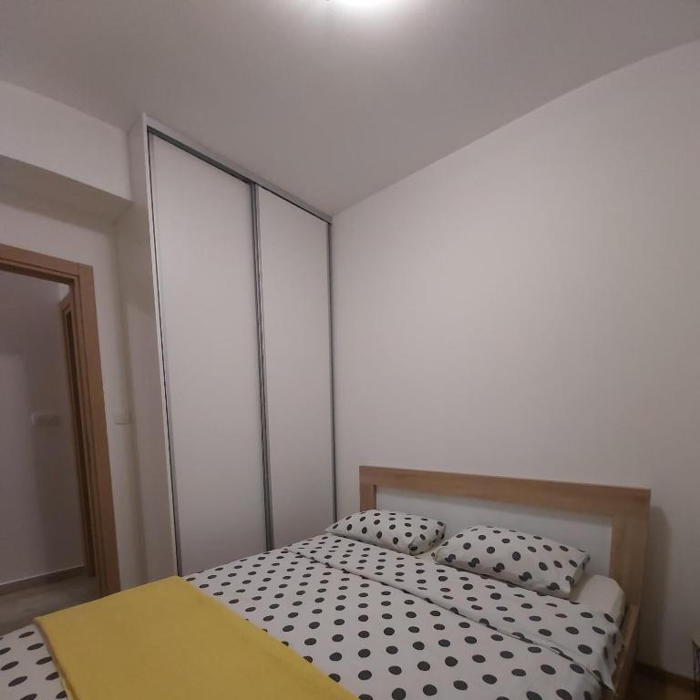 Postel nebo postele na pokoji v ubytování Apartman Miss T
