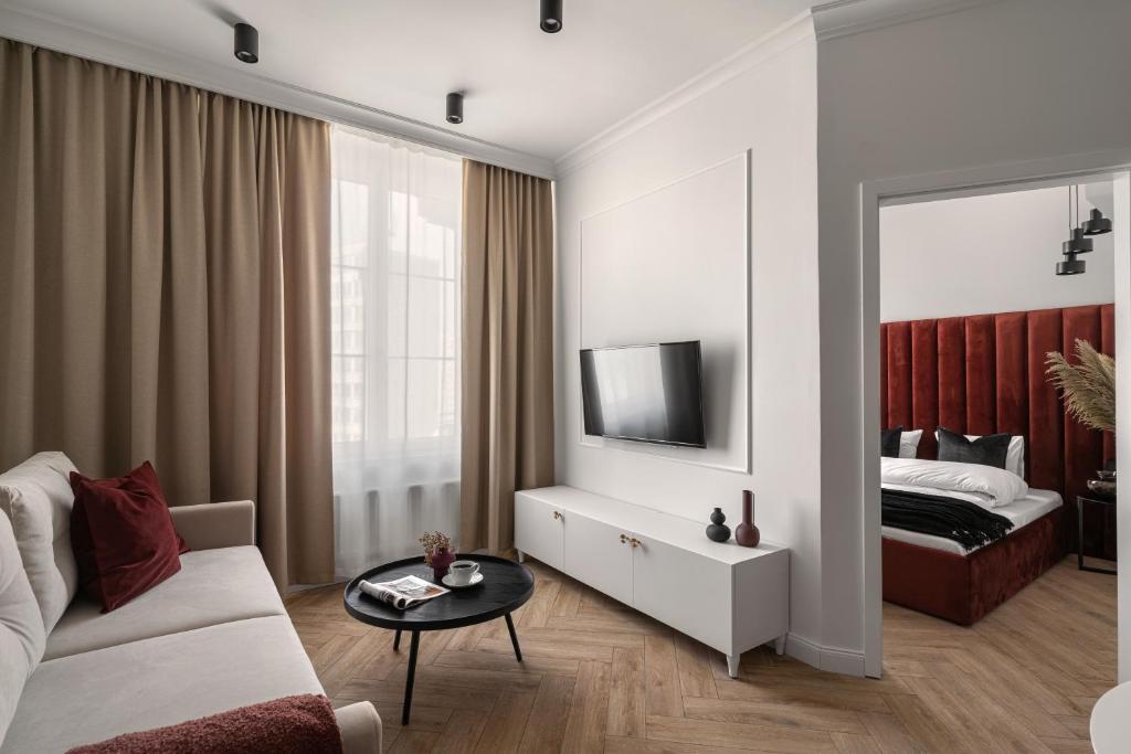 Posteľ alebo postele v izbe v ubytovaní APARTIO ROOMS Katowice