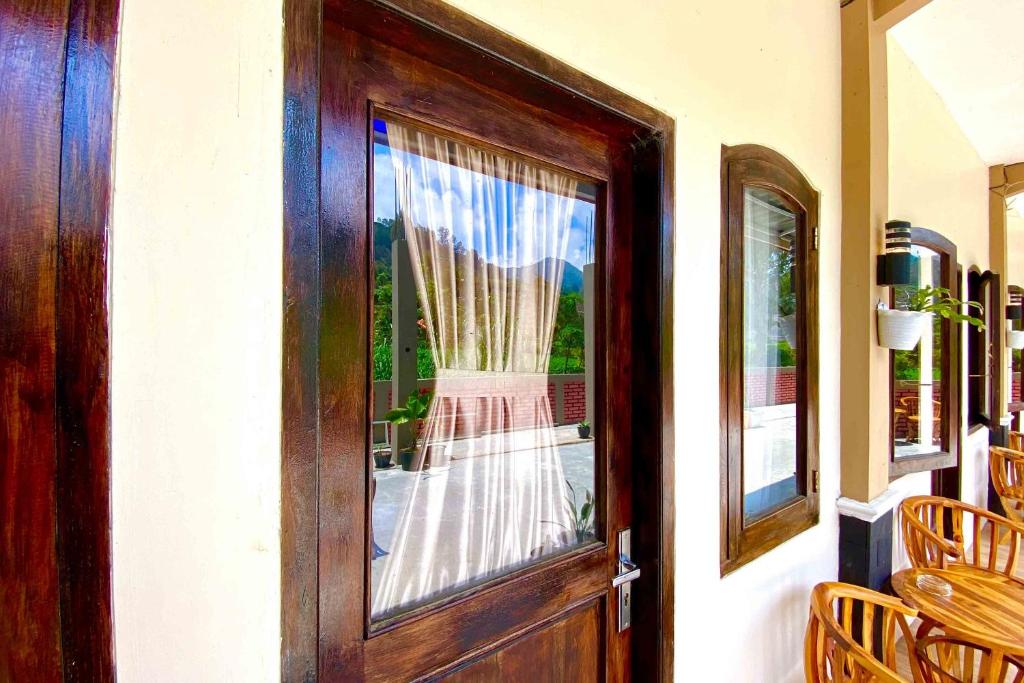 Fotografie z fotogalerie ubytování Homestay Banteng Adventure Dieng Mitra RedDoorz v destinaci Diyeng