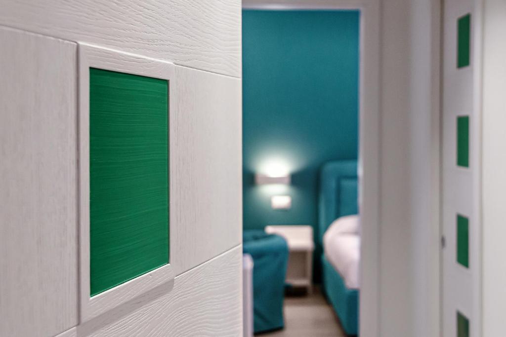 Postel nebo postele na pokoji v ubytování Tiffany Suites