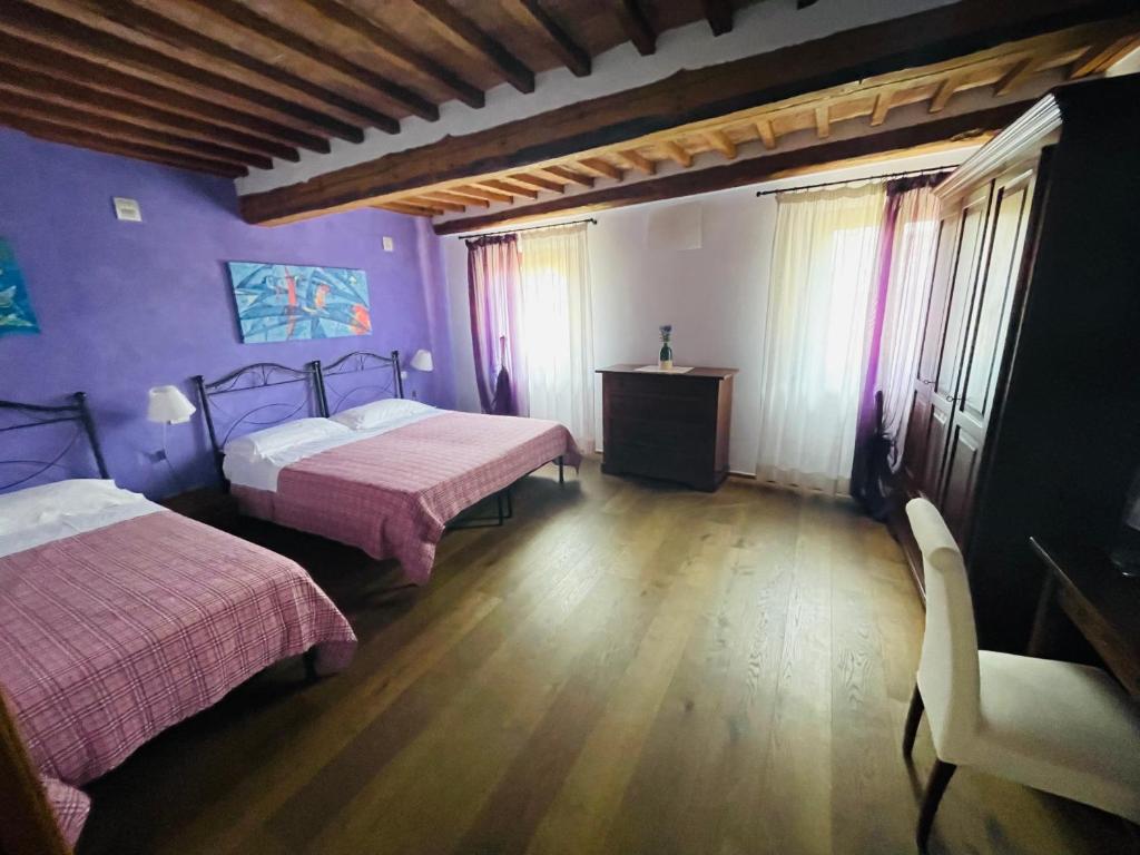Postel nebo postele na pokoji v ubytování Bed & Breakfast Montepulciano