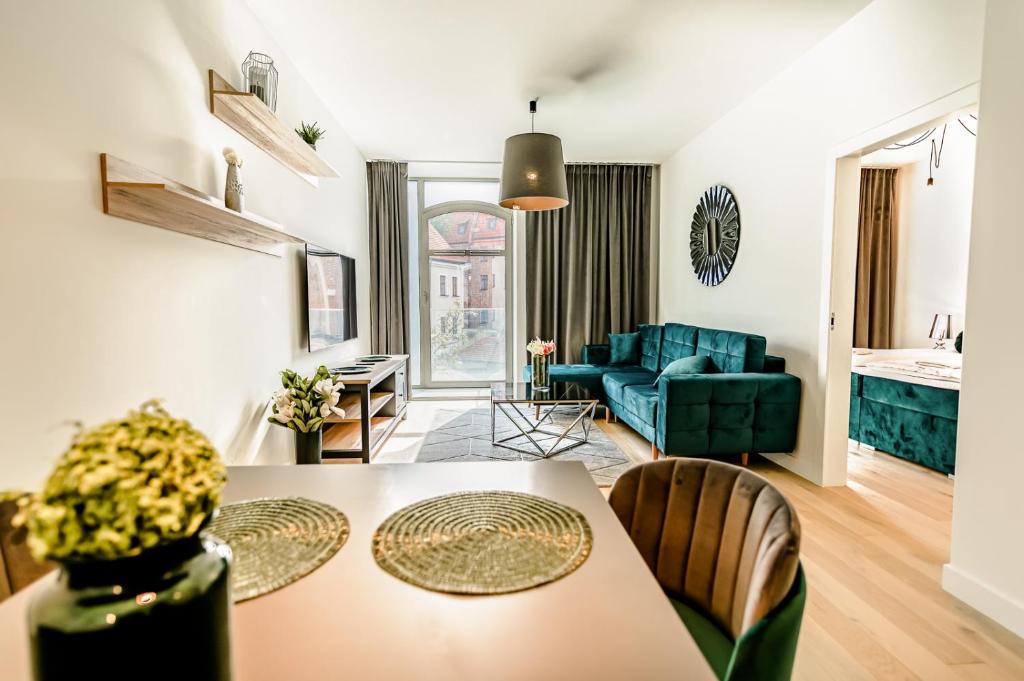 Posedenie v ubytovaní AboutArtApartments - Młyn Maria