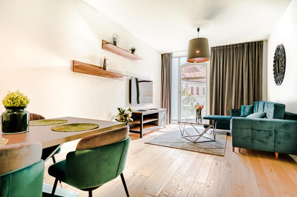 Posedenie v ubytovaní AboutArtApartments - Młyn Maria