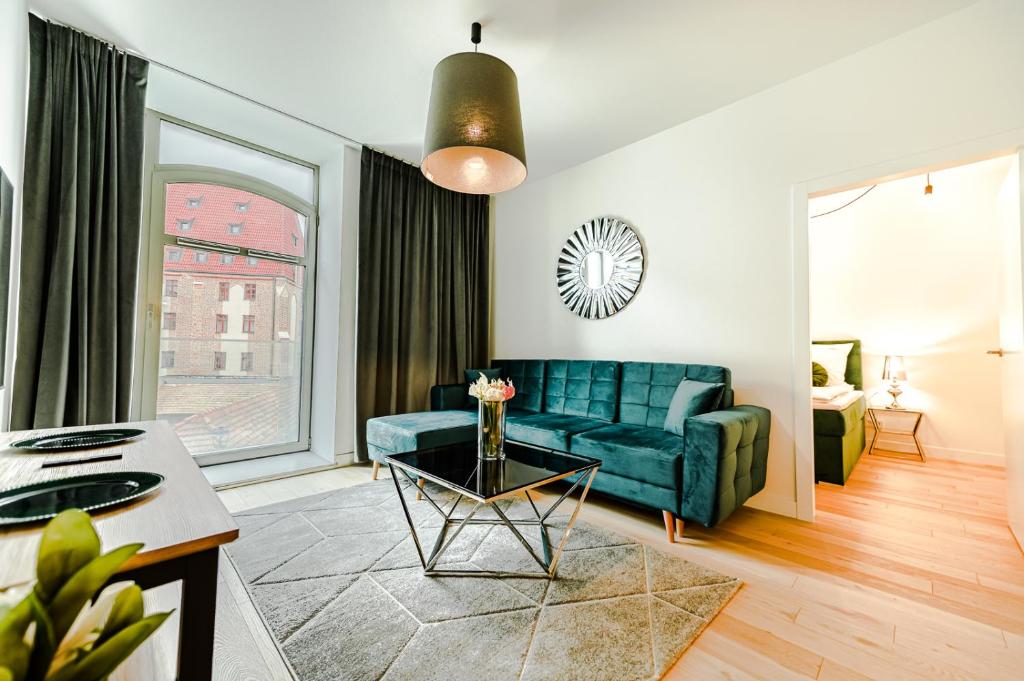 Posedenie v ubytovaní AboutArtApartments - Młyn Maria
