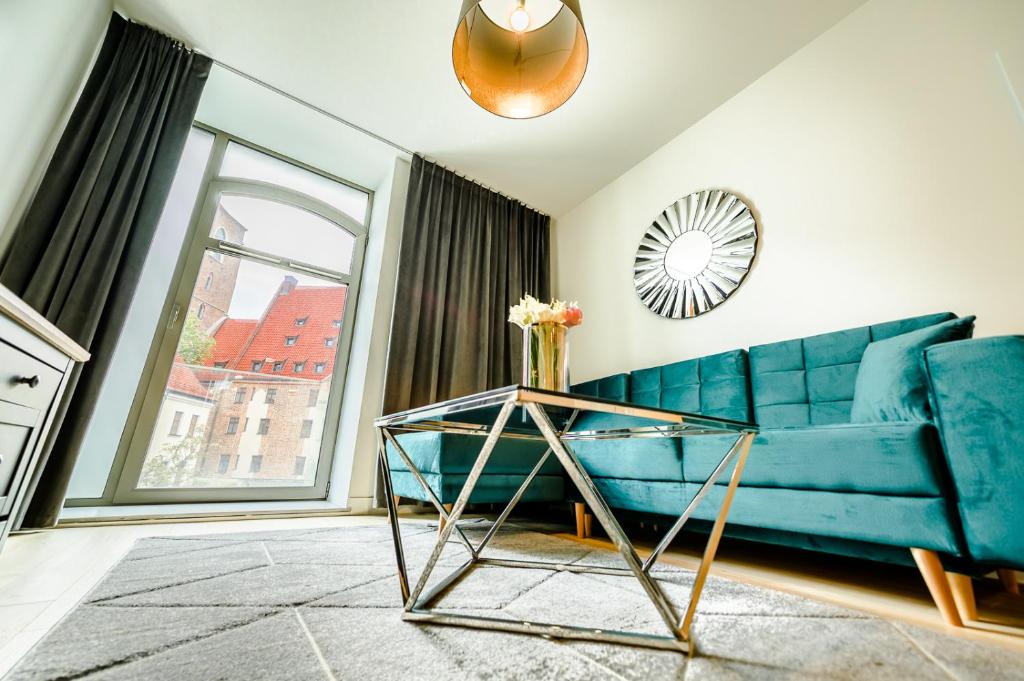 Posedenie v ubytovaní AboutArtApartments - Młyn Maria