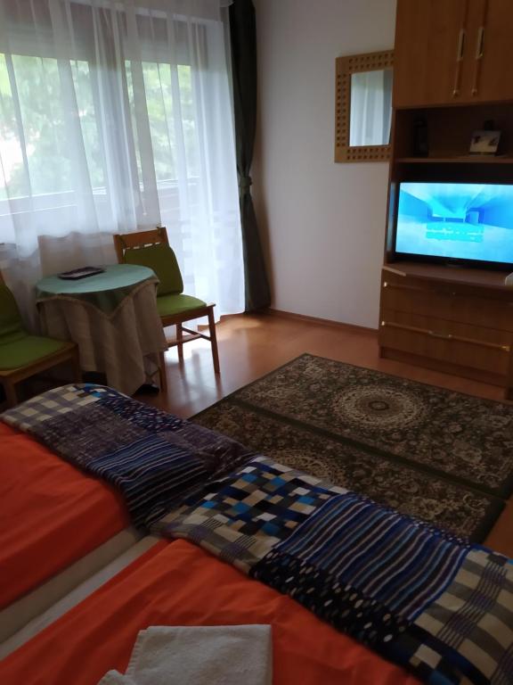 Letto o letti in una camera di Nimród Pihenőház