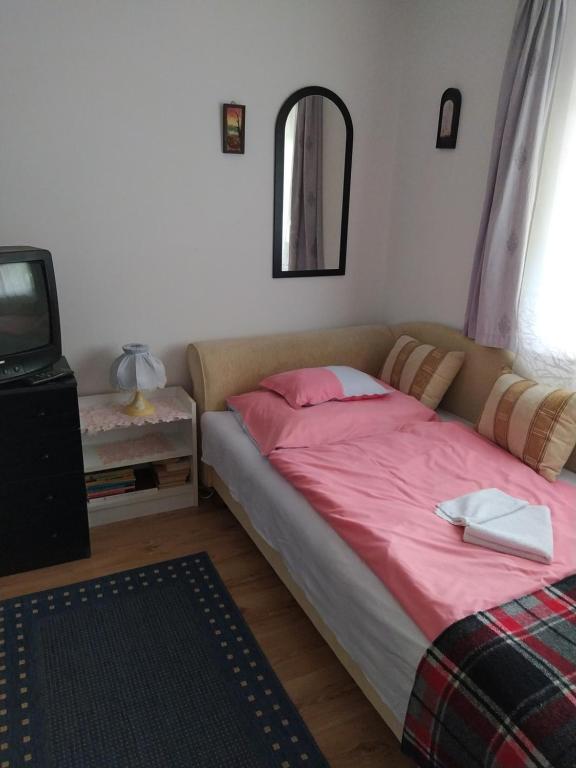 Letto o letti in una camera di Nimród Pihenőház