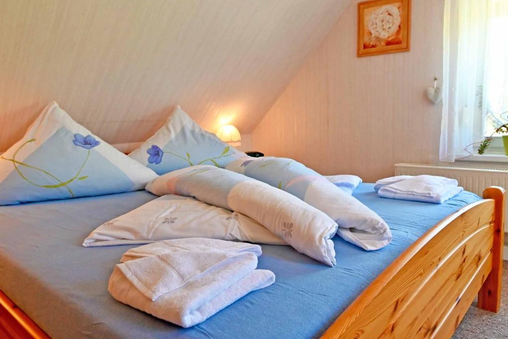 Postel nebo postele na pokoji v ubytování Ferienwohnung Tammer