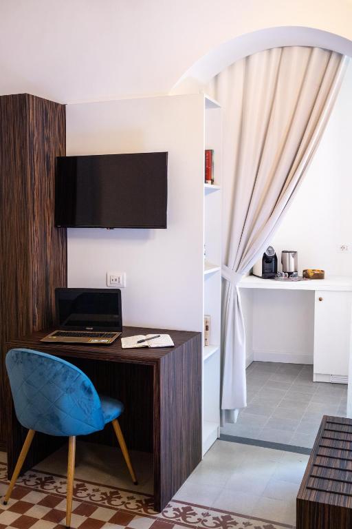 Kuchyň nebo kuchyňský kout v ubytování Riflessi Acireale Palace Suites