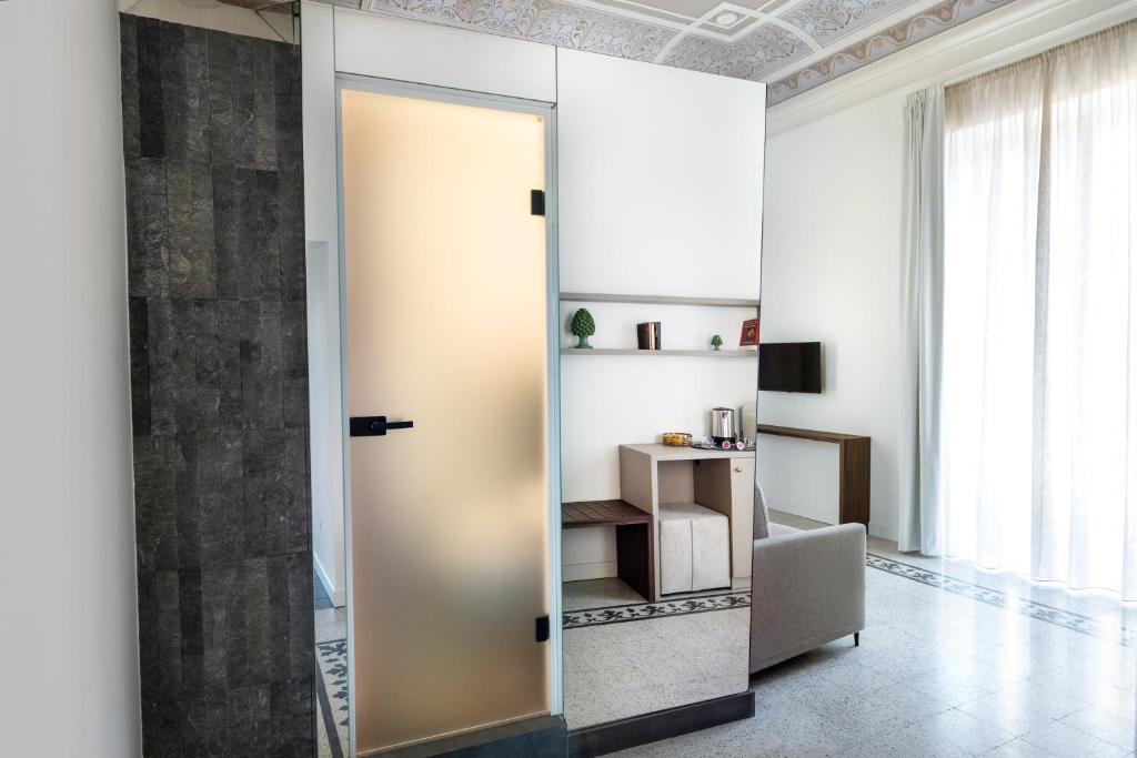 Kuchyň nebo kuchyňský kout v ubytování Riflessi Acireale Palace Suites