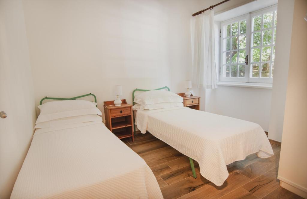 Postel nebo postele na pokoji v ubytování Casale Barbi