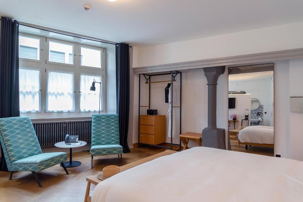 Postel nebo postele na pokoji v ubytování Marktgasse Hotel