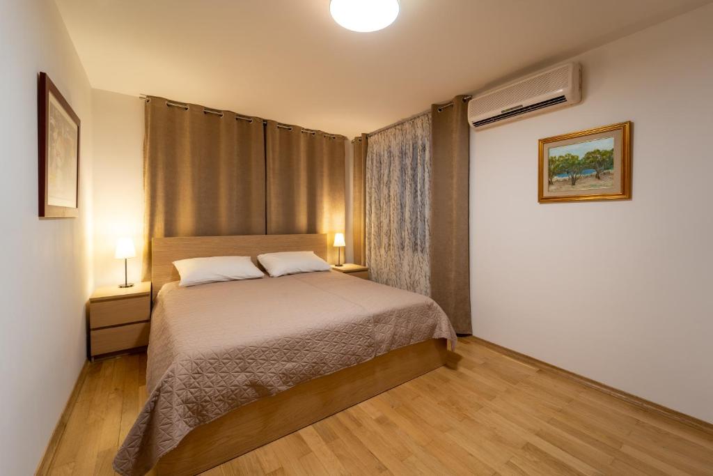 Postel nebo postele na pokoji v ubytování Erika