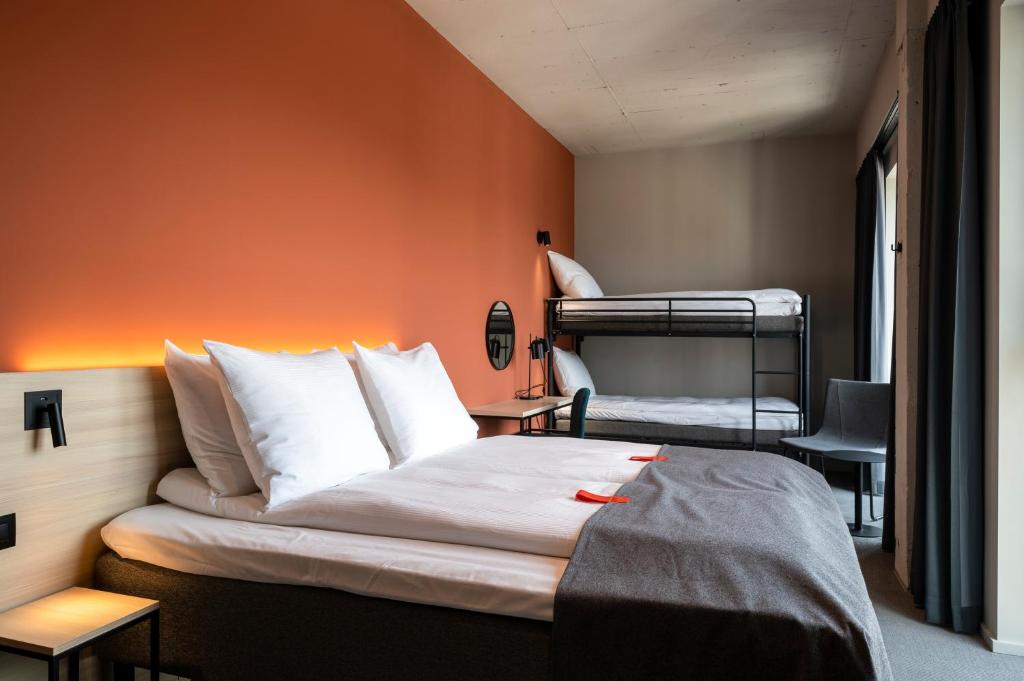 Llit o llits en una habitació de Citybox Antwerp