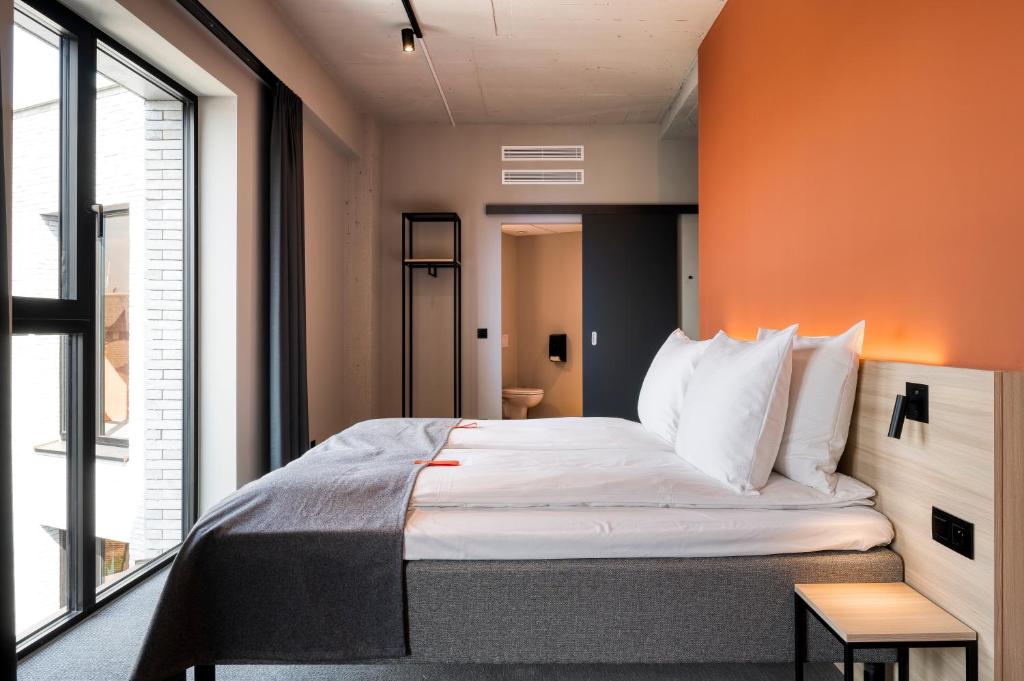 Llit o llits en una habitació de Citybox Antwerp