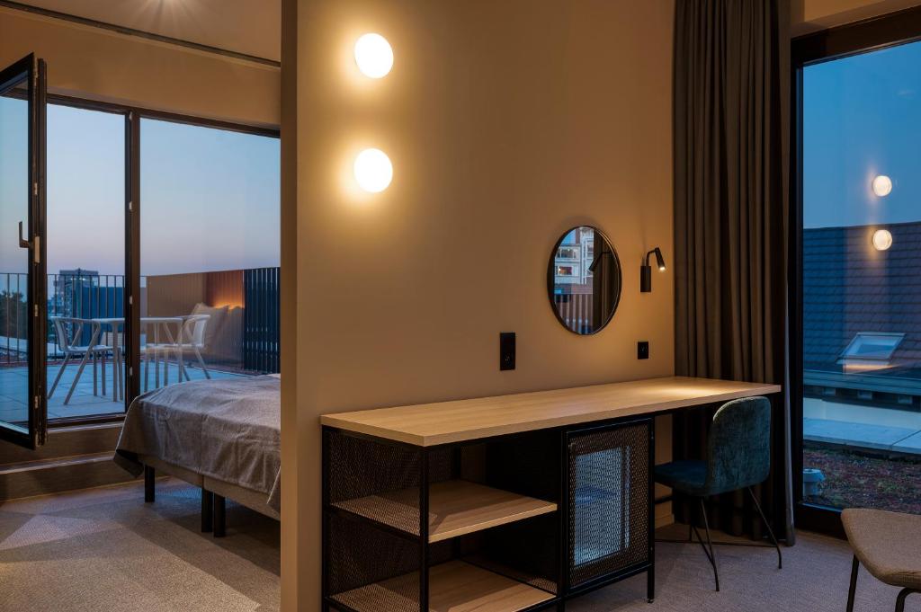 Llit o llits en una habitació de Citybox Antwerp