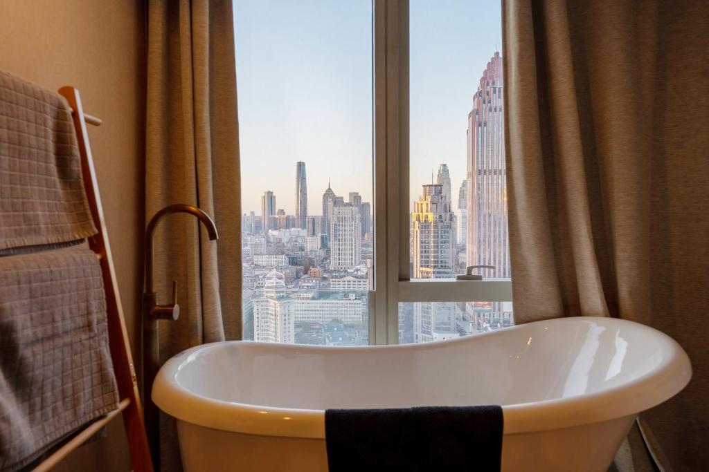 Fotografie z fotogalerie ubytování Tianjin G'apartment - Five Great Avenues v destinaci Tchien-ťin