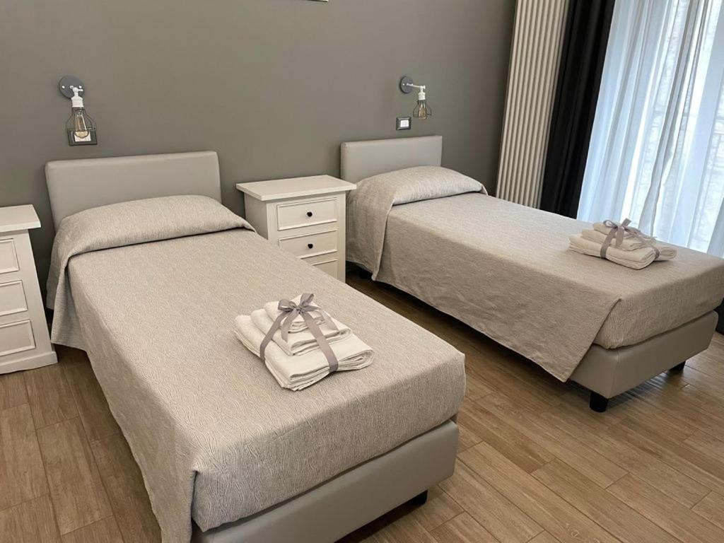A bed or beds in a room at Nina e il mare