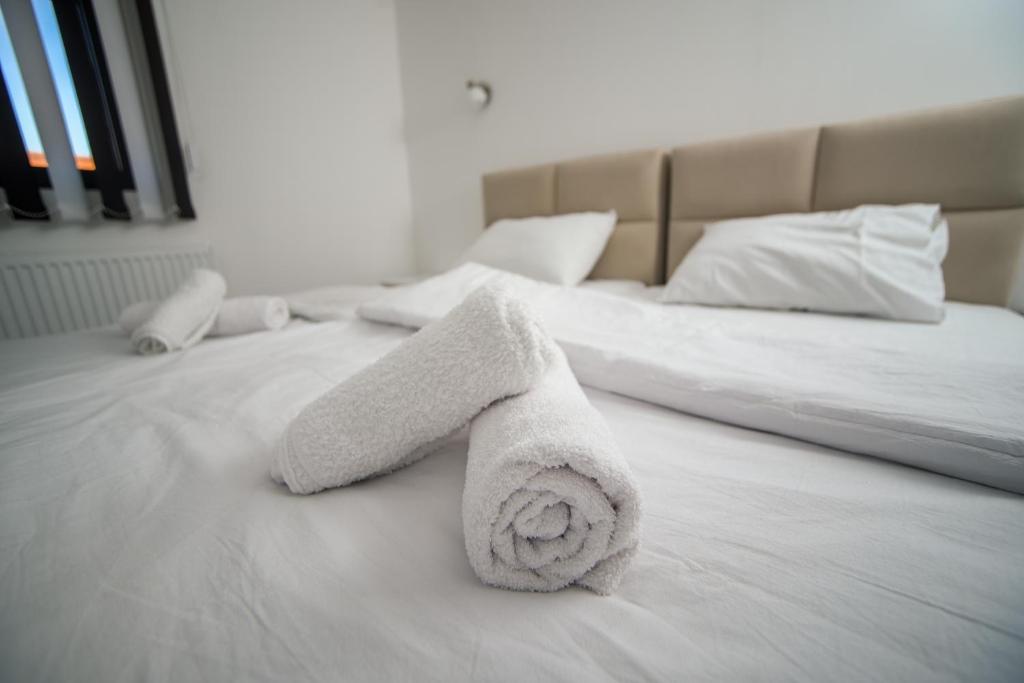 Postel nebo postele na pokoji v ubytování Prenociste ADRIA