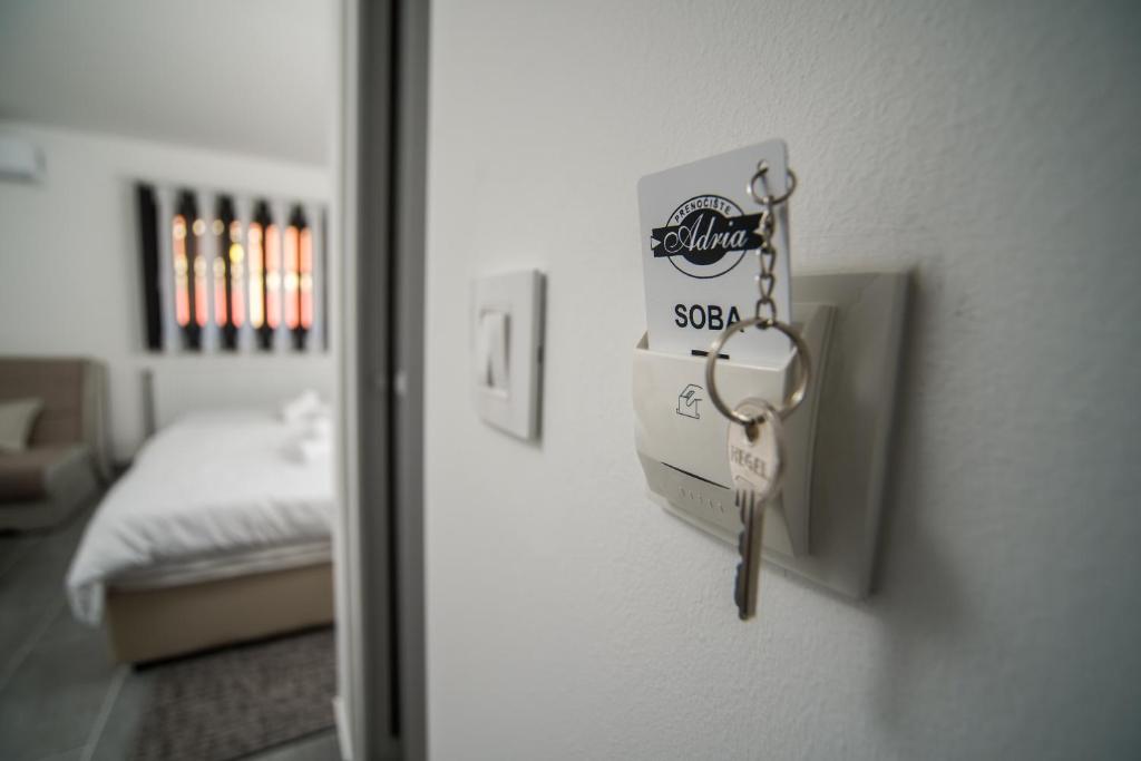 Postel nebo postele na pokoji v ubytování Prenociste ADRIA