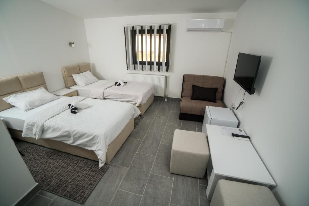 Postel nebo postele na pokoji v ubytování Prenociste ADRIA