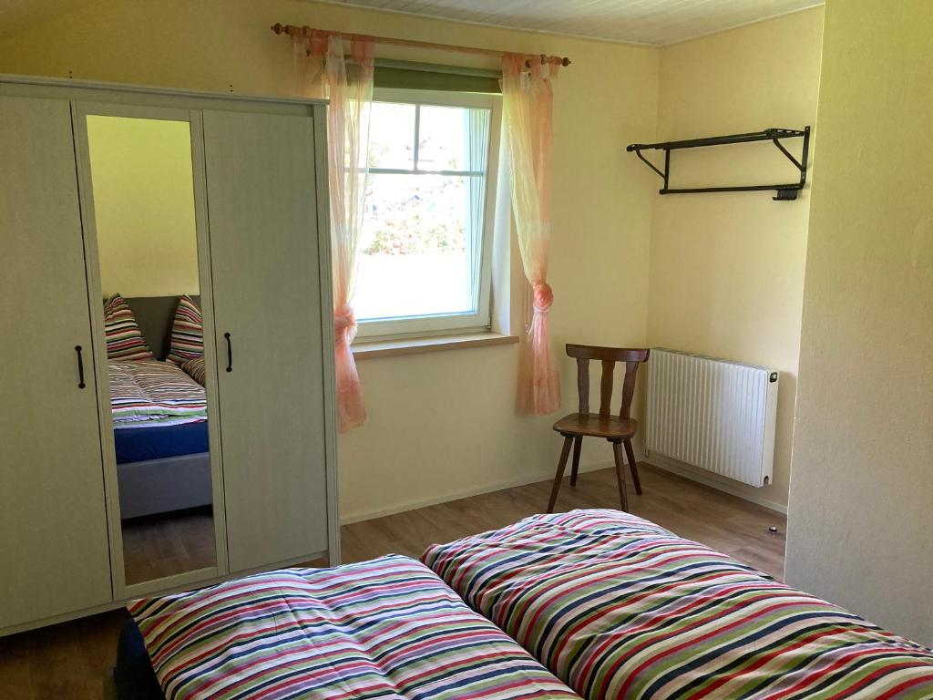 Postel nebo postele na pokoji v ubytování FerienFuchs