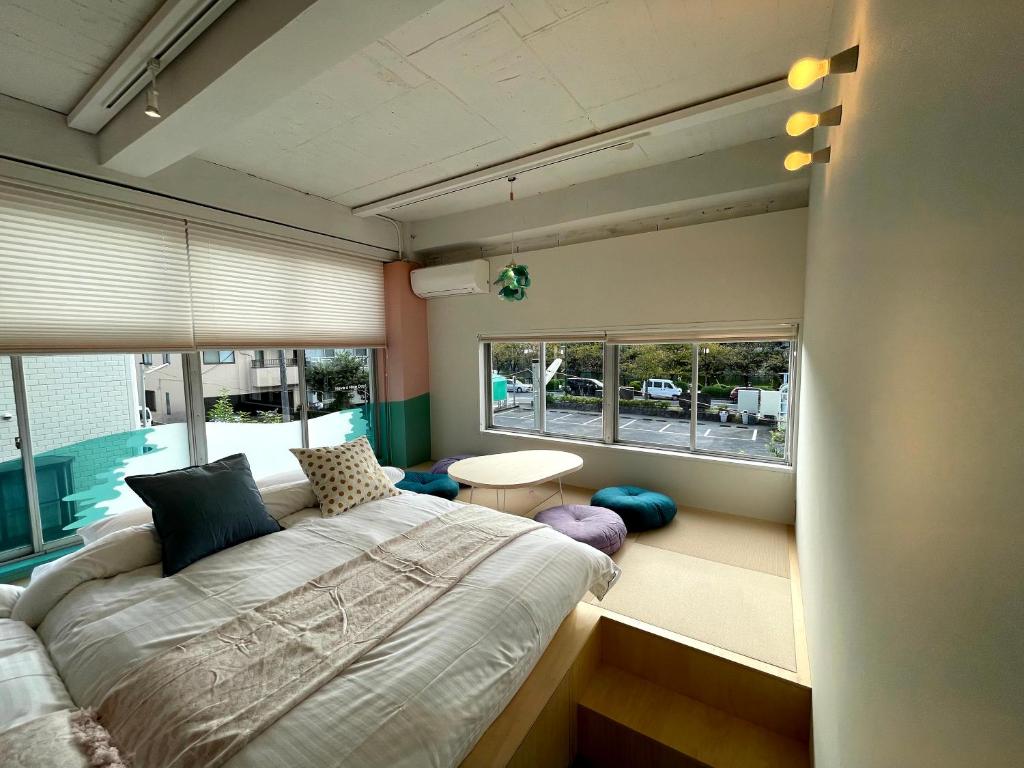 Postel nebo postele na pokoji v ubytování Hostel Have a Nice Day! ドミトリー 個室ルームあり#HVNI