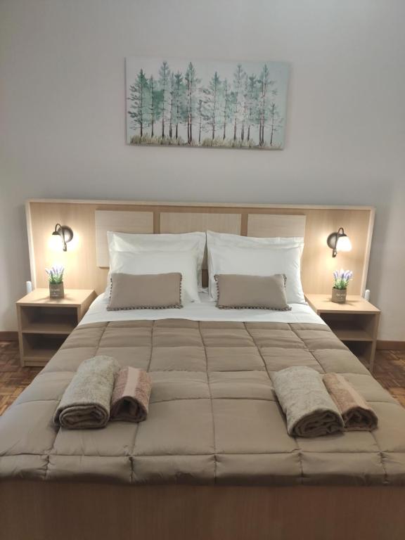 Кровать или кровати в номере Gioiello di Corfu apartment