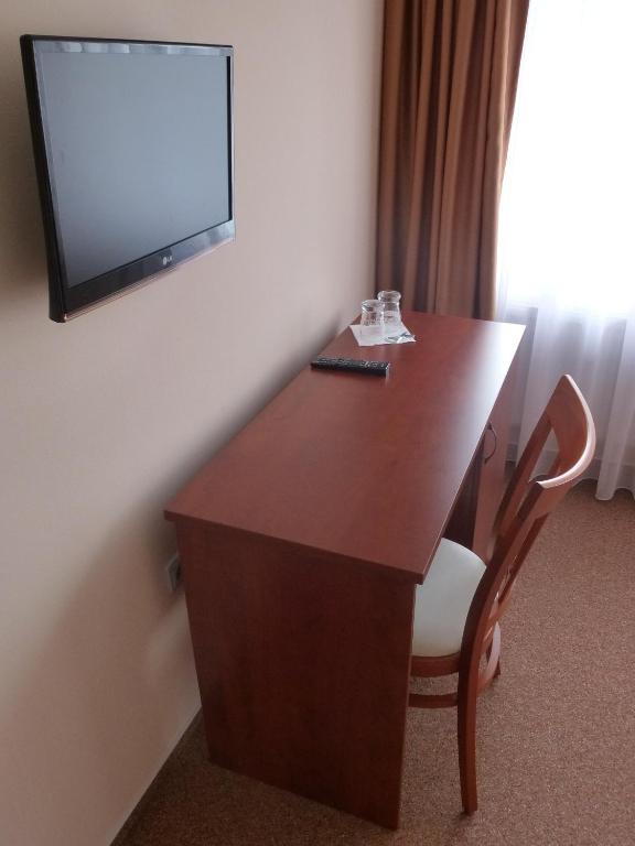 TV a/nebo společenská místnost v ubytování Hotel Rudka