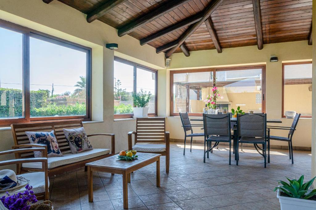 A seating area at Villa la Tonnara CaseSicule, Private Villa far 50 m from the Sand Beach