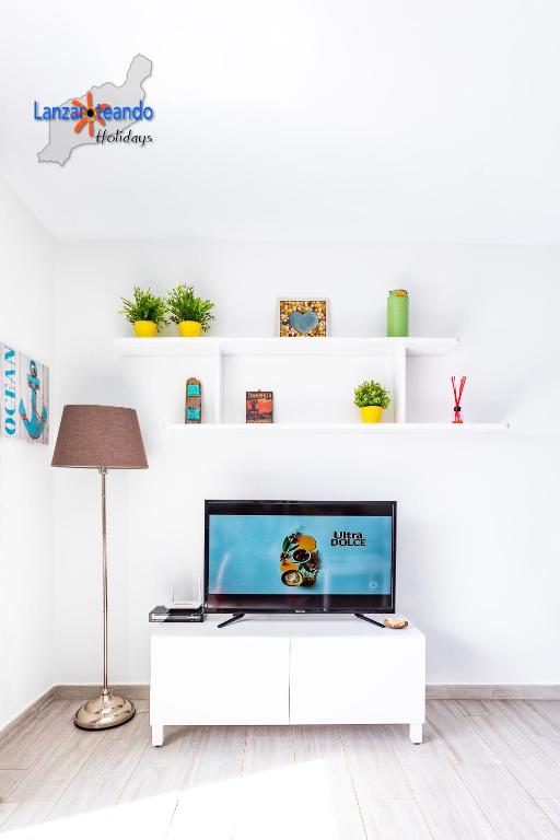 TV a/nebo společenská místnost v ubytování Vivienda Vacacional Serendipity