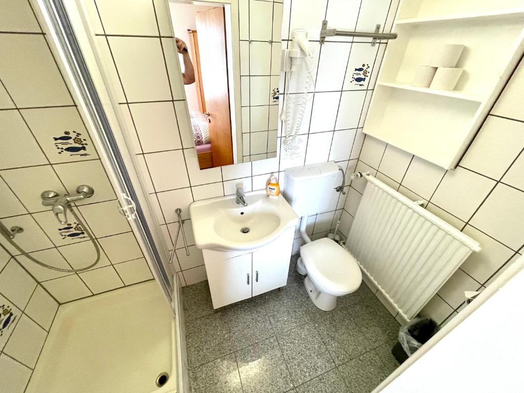 Koupelna v ubytování Hotel Charlott